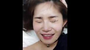 lying on her back Asian facial