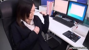 Asian office worker with stockings rubs her pussy with a sex toy